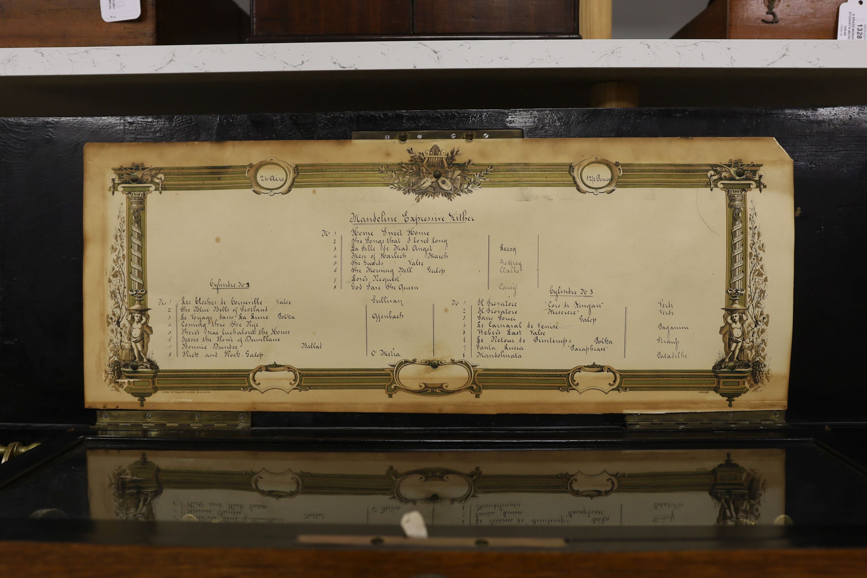 A late 19th century Swiss musical box with 92 tooth comb (one tooth broken and missing), with eight tune 13 inch cylinder and two additional cylinders, the case re-veneered in oak, 79cm wide